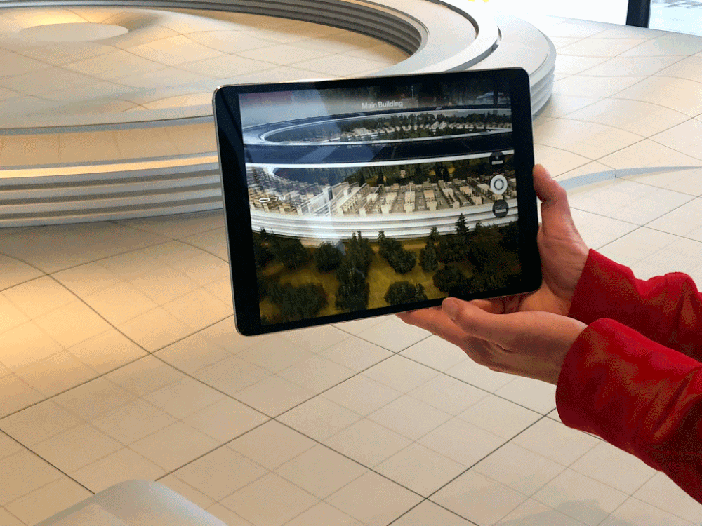  Checking out the Apple Park Visitor's Center Augmented Reality experience overlaid on a scale model of the new campus.  